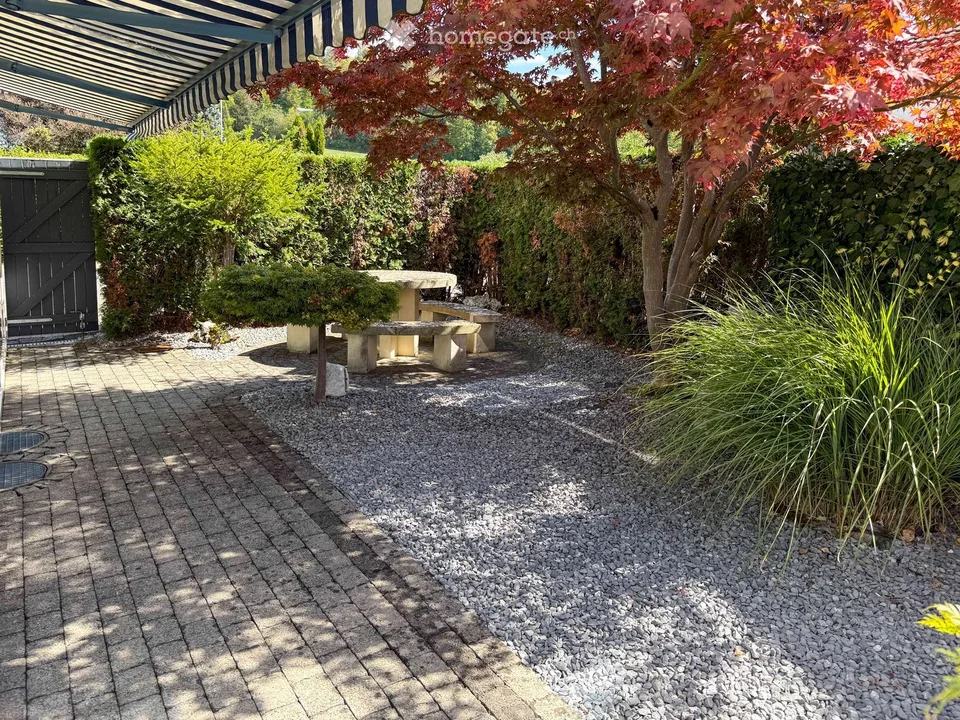 Appartamento di giardino esclusivo 4.5 locali con quattro posti auto, camino e sauna – foto 7 di 20