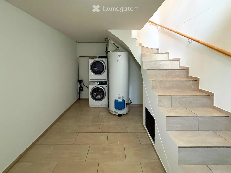 Appartamento di giardino esclusivo 4.5 locali con quattro posti auto, camino e sauna – foto 14 di 20
