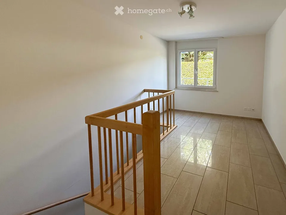 Appartamento di giardino esclusivo 4.5 locali con quattro posti auto, camino e sauna – foto 13 di 20