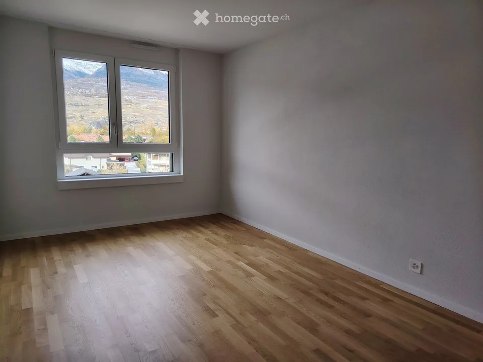 Two-and-a-half-room apartment with view + indoor parking space
