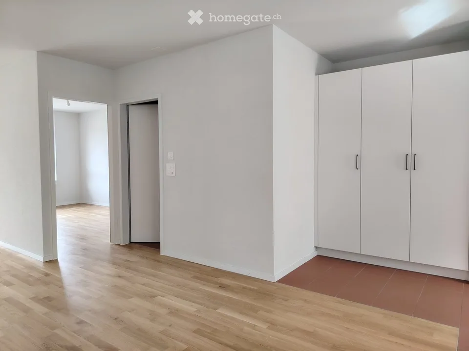 Two-and-a-half-room apartment with view + indoor parking space