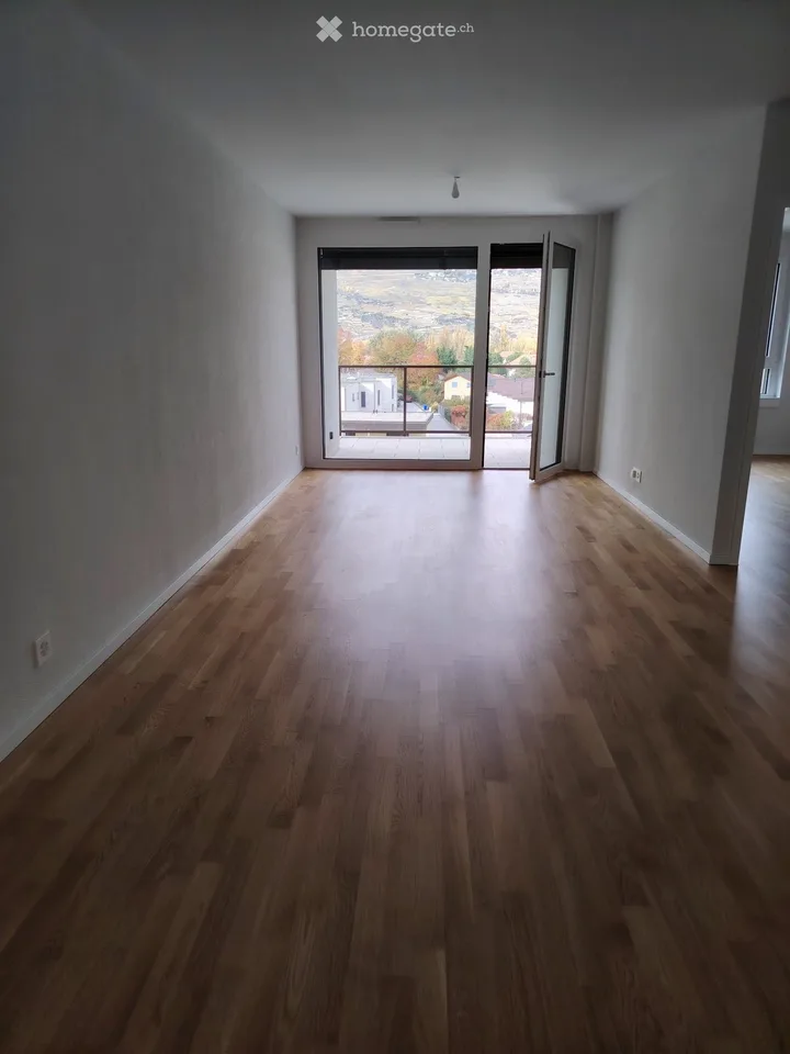 Two-and-a-half-room apartment with view + indoor parking space