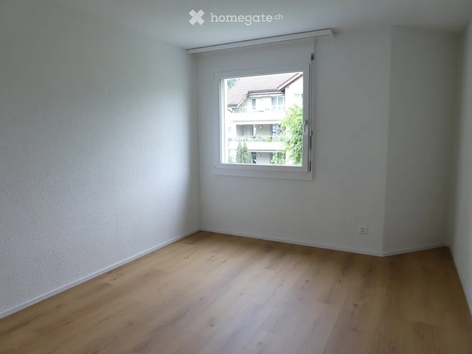 Appartement lumineux 4.5 pièces avec balcon et cheminée à Stansstad