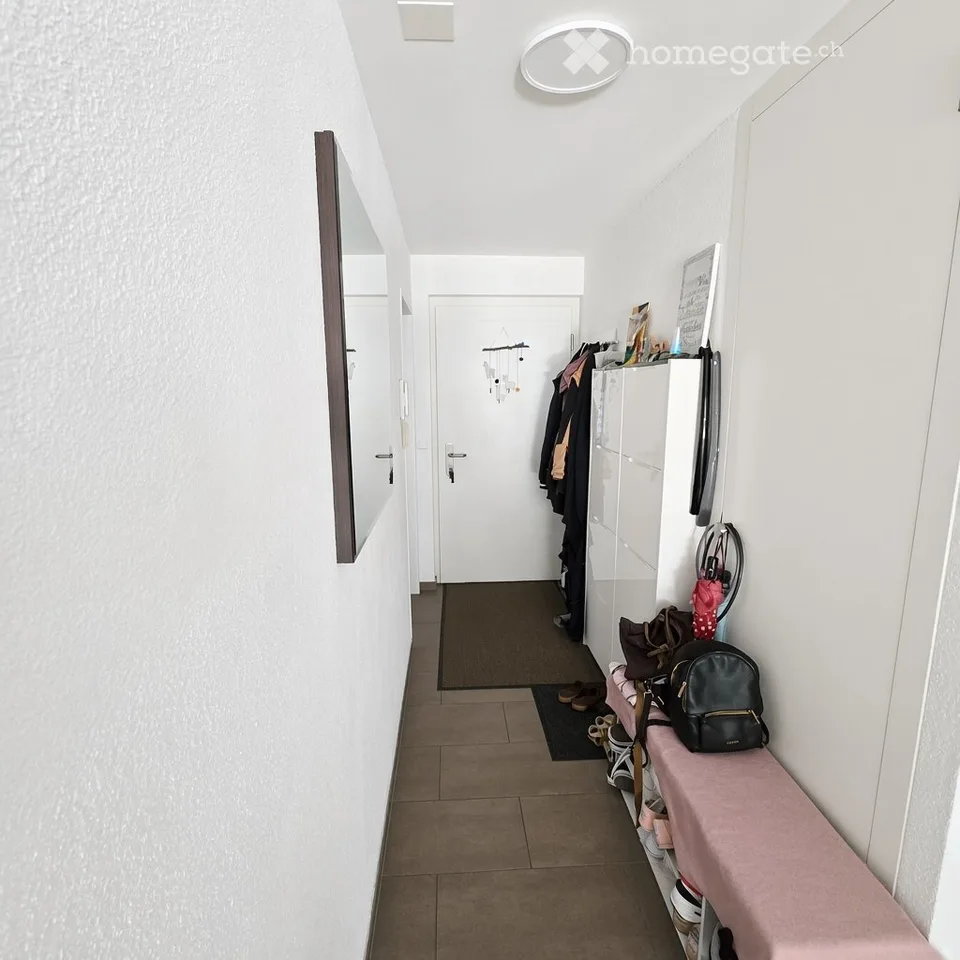 4.5-room apartment with garden and 2 parking spaces