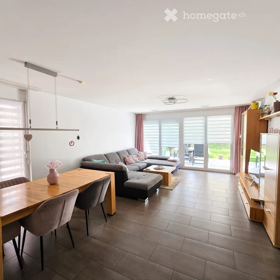 4.5-room apartment with garden and 2 parking spaces