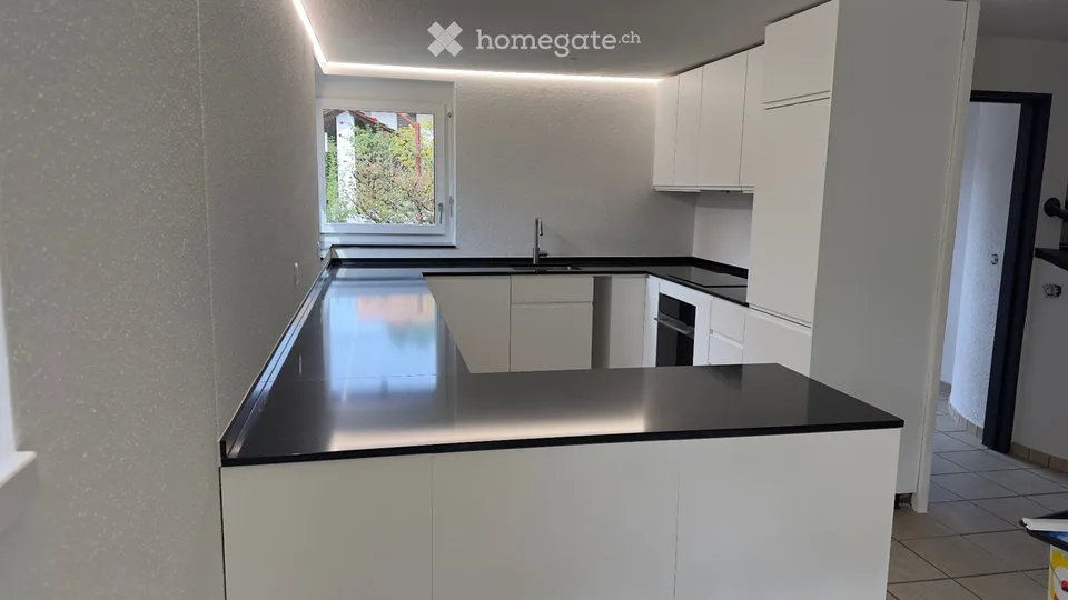 Casa unifamiliare rinnovata con giardino & molto comfort abitativo a Rafz