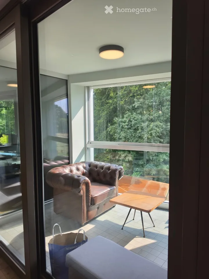 Modern 2.5-room apartment with pool, gym & rooftop terrace