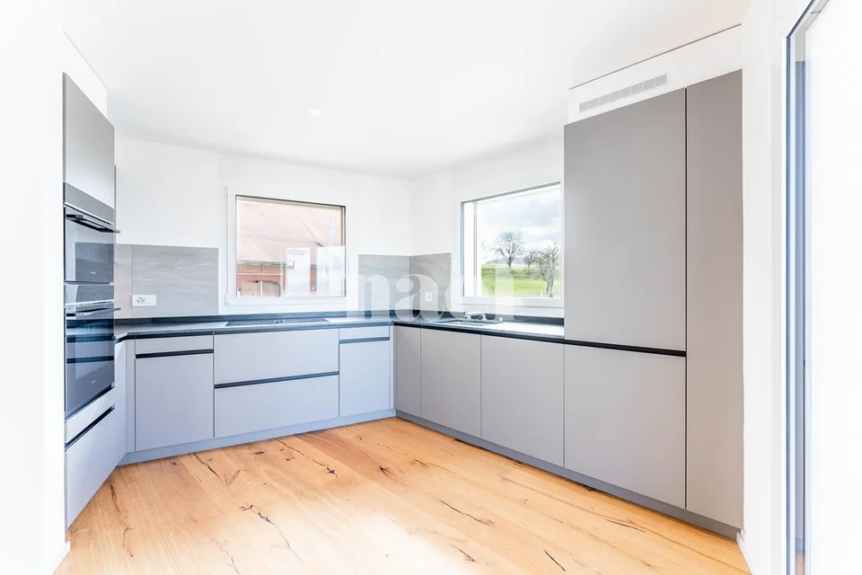 New 5.5-room duplex apartment with large terrace and balcony for sale in Prévonloup – photo 2 of 10