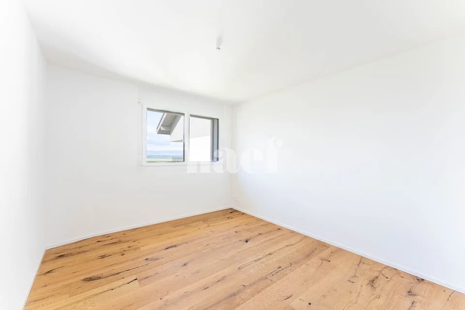 New 5.5-room duplex apartment with large terrace and balcony for sale in Prévonloup – photo 5 of 10