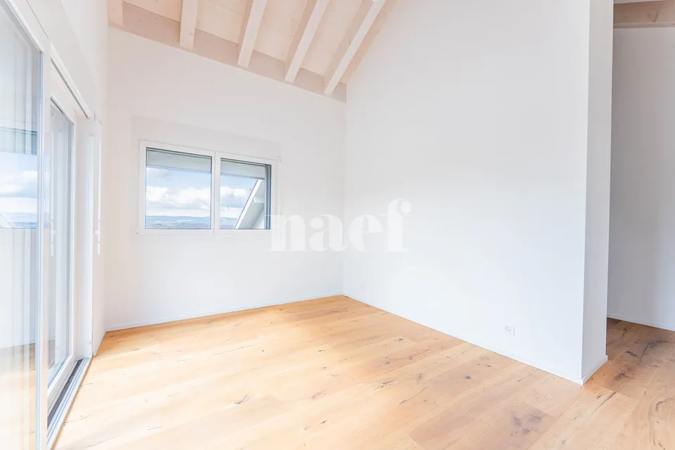 New 5.5-room duplex apartment with large terrace and balcony for sale in Prévonloup – photo 6 of 10