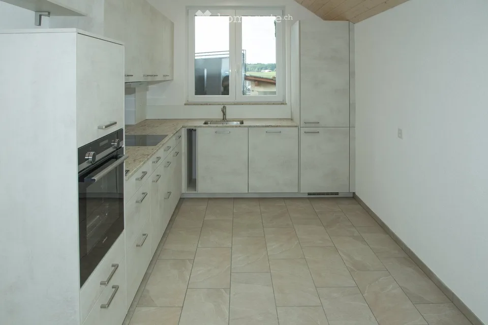 Casa unifamiliare di 4½ locali con giardino e garage