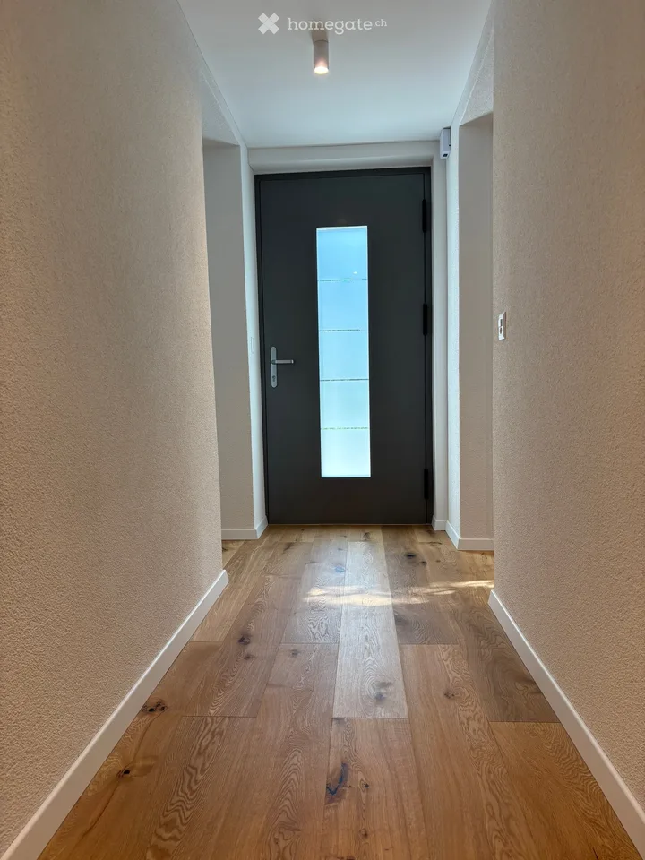 Modern 2.5-room apartment in initial occupancy with private garden/seat