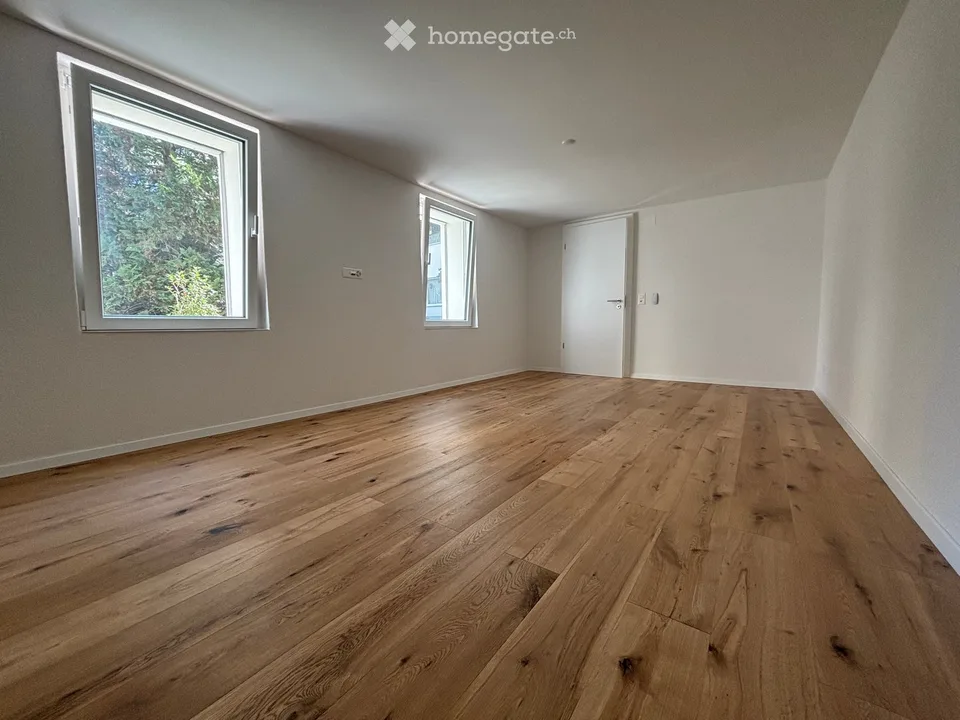 Modern 2.5-room apartment in initial occupancy with private garden/seat