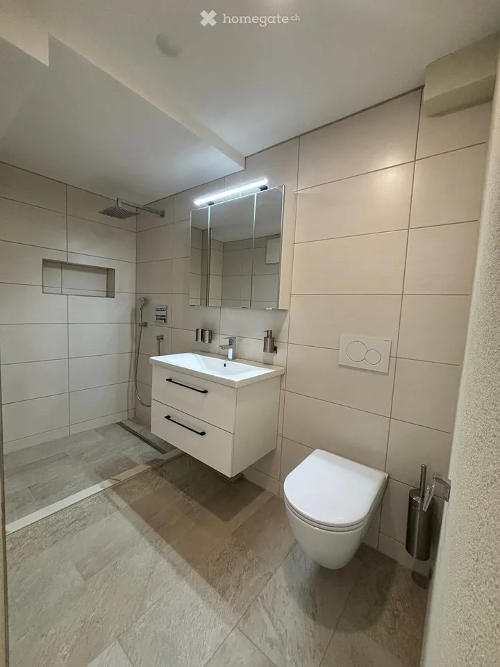 Modern 2.5-room apartment in initial occupancy with private garden/seat
