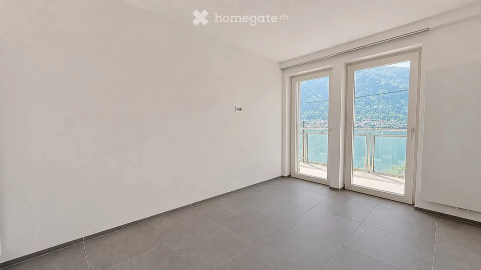 Elegante appartement 4,5 pièces avec vue splendide sur le lac à Capolago