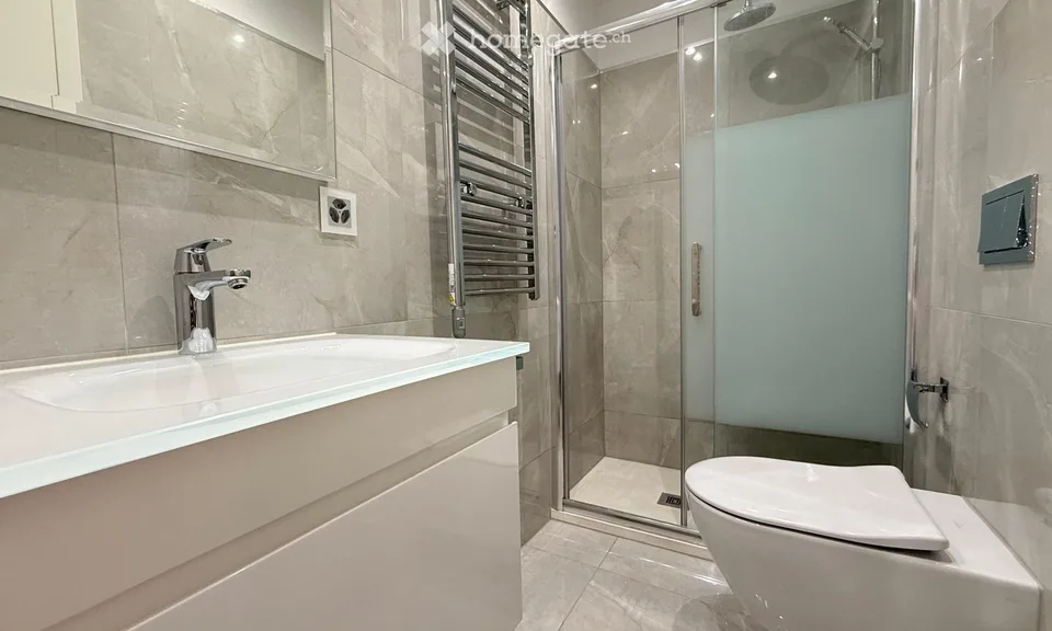 Elegante appartement 4,5 pièces avec vue splendide sur le lac à Capolago