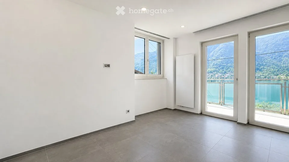 Elegante appartement 4,5 pièces avec vue splendide sur le lac à Capolago
