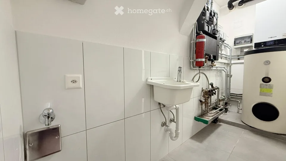 Elegante appartement 4,5 pièces avec vue splendide sur le lac à Capolago
