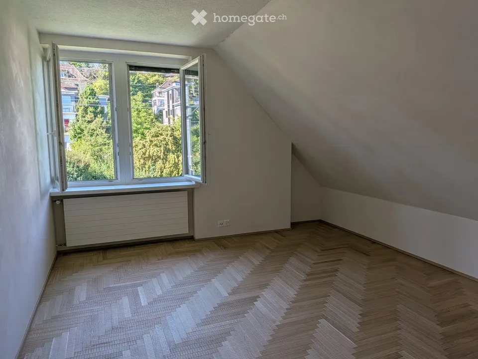 Exceptional Attic Apartment in Thalwil with 180° Views of Lake Zurich and the Alps