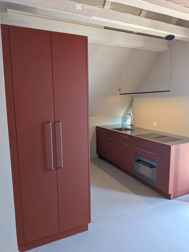 Exceptional Attic Apartment in Thalwil with 180° Views of Lake Zurich and the Alps