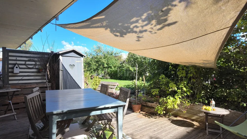 Superbe maison mitoyenne avec jardin arboré – photo 12 sur 13