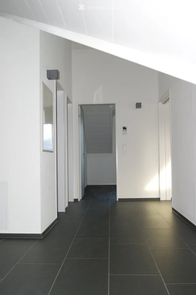 Exclusive 3.5-room attic apartment with panoramic views in Tuggen