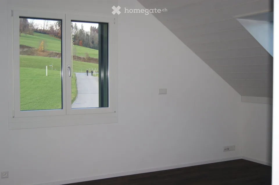 Exclusive 3.5-room attic apartment with panoramic views in Tuggen