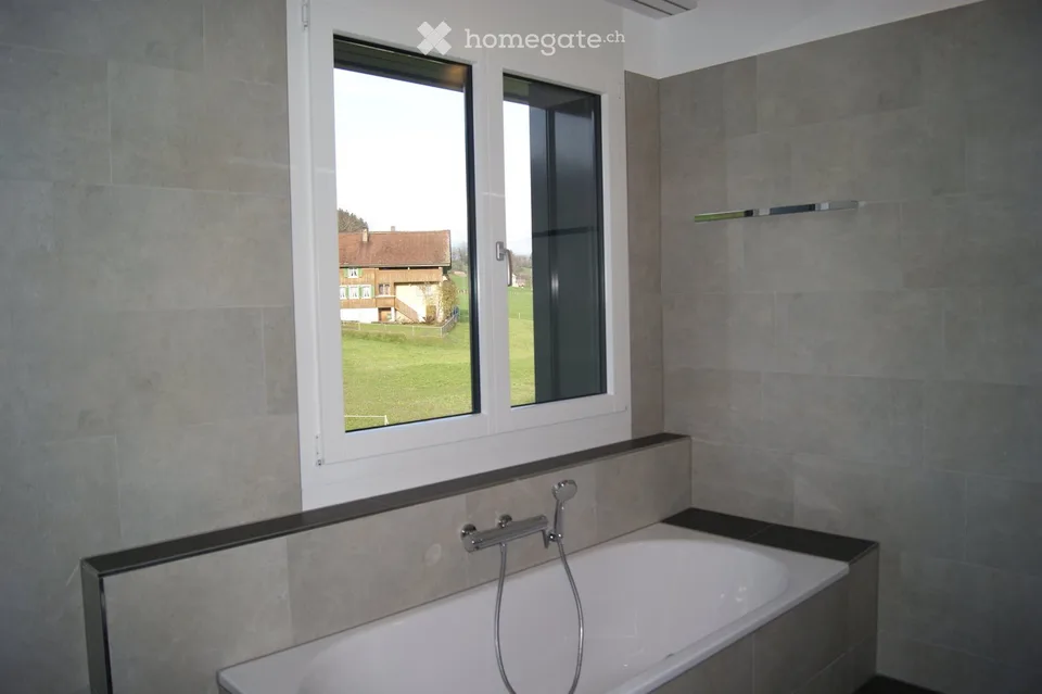 Exclusive 3.5-room attic apartment with panoramic views in Tuggen