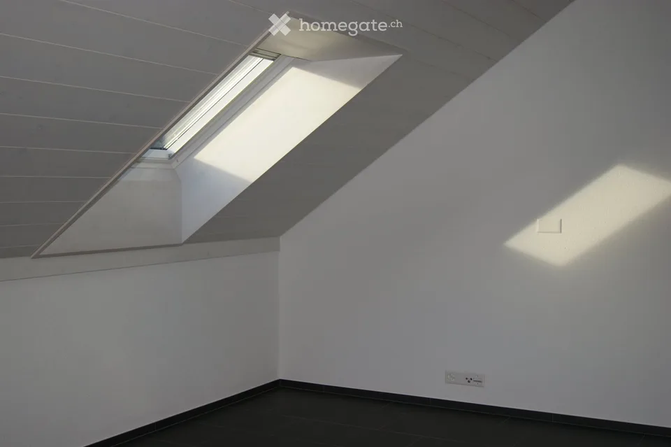 Exclusive 3.5-room attic apartment with panoramic views in Tuggen
