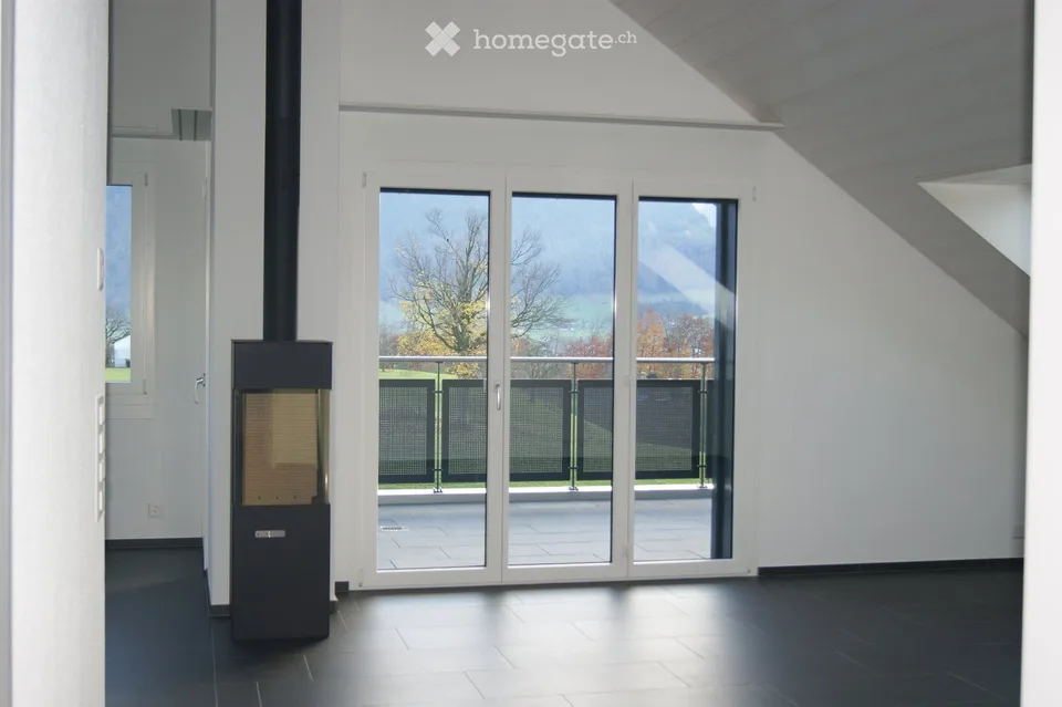 Exclusive 3.5-room attic apartment with panoramic views in Tuggen