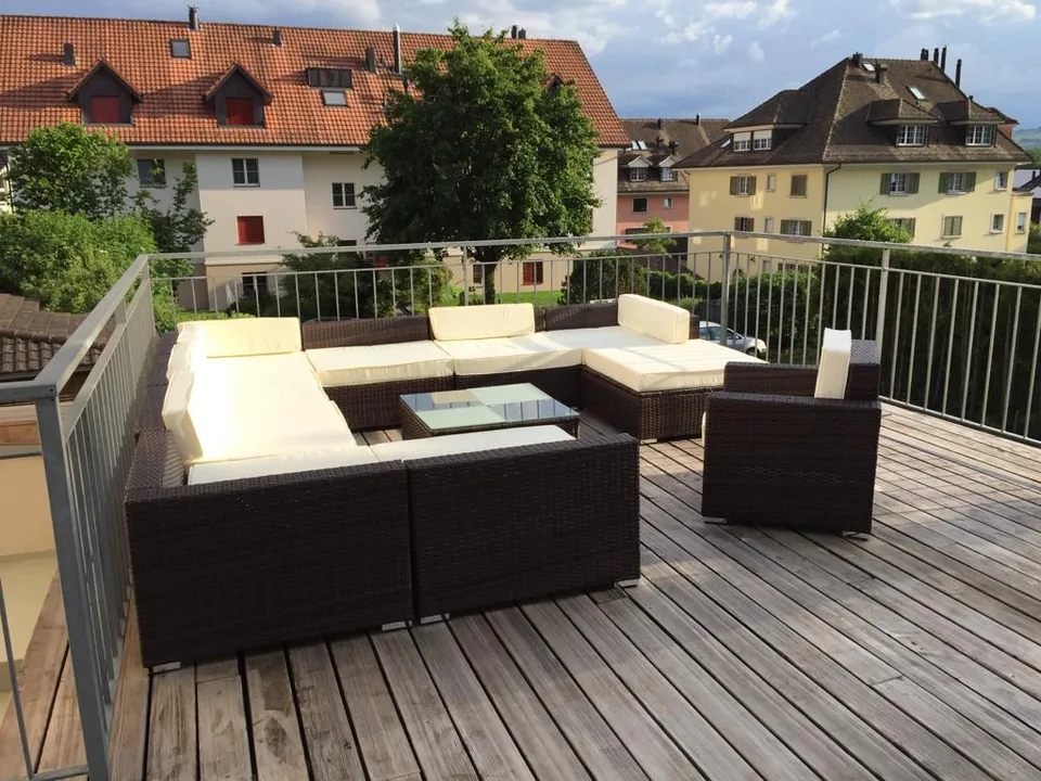 Charmant appartement loft avec cheminée et vue sur le lac à Uetikon am See
