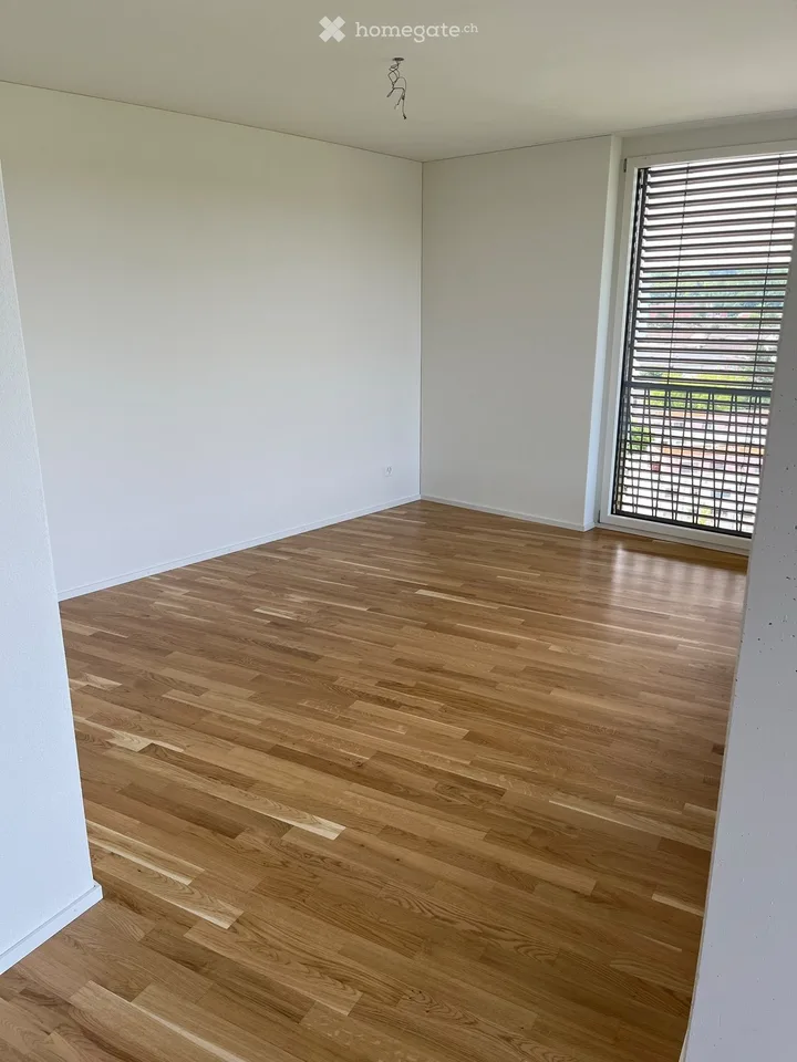 Moderne 2.5-Zimmer-Neubauwohnung im 9. Stock mit Loggia in Allschwil