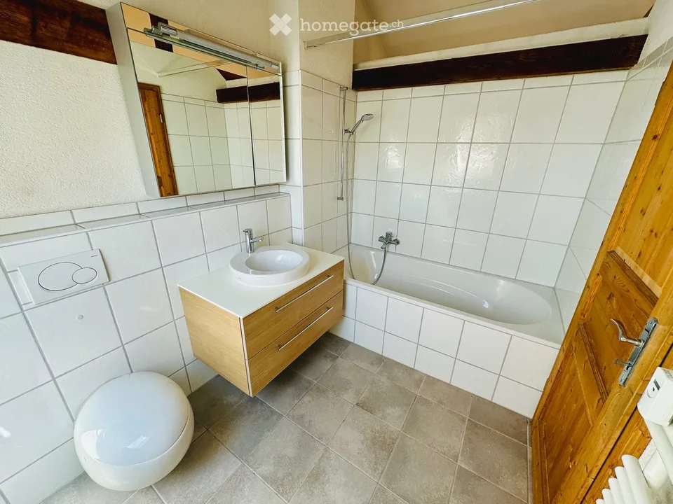 Charmante Loft-Dachwohnung im Gundeli mit Balkon