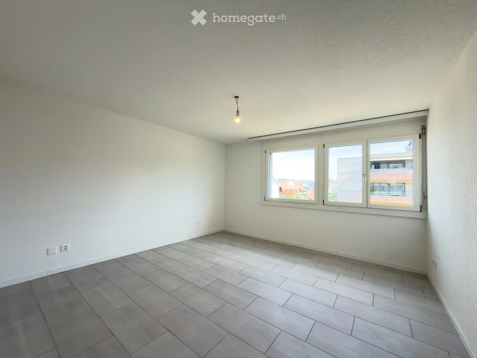 Appartement rénové de 3,5 pièces avec balcon