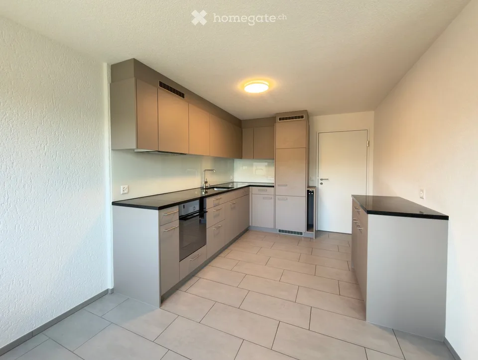 Appartement rénové de 3,5 pièces avec balcon