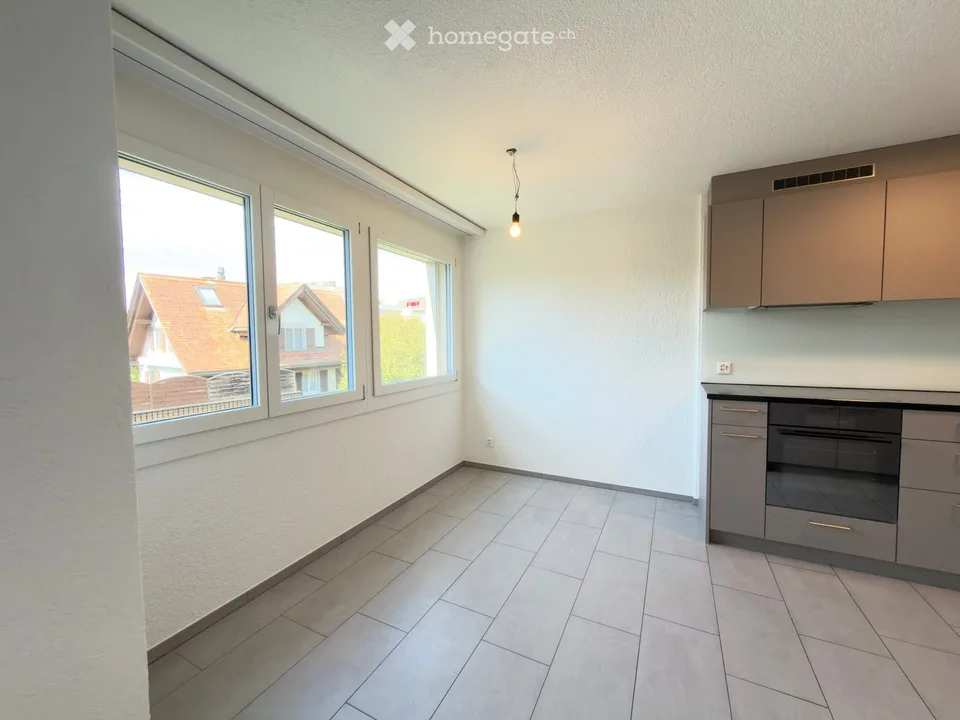 Appartement rénové de 3,5 pièces avec balcon