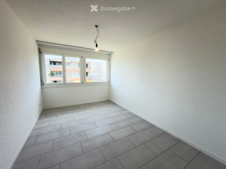 Appartement rénové de 3,5 pièces avec balcon
