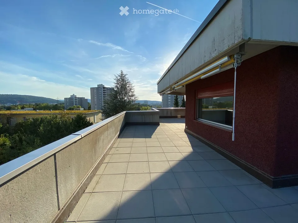 Spacious attic apartment with wrap-around terrace and panoramic view