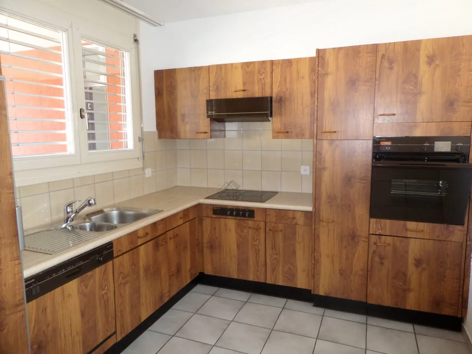 Appartement de 2.5 pièces dans un quartier verdoyant et calme