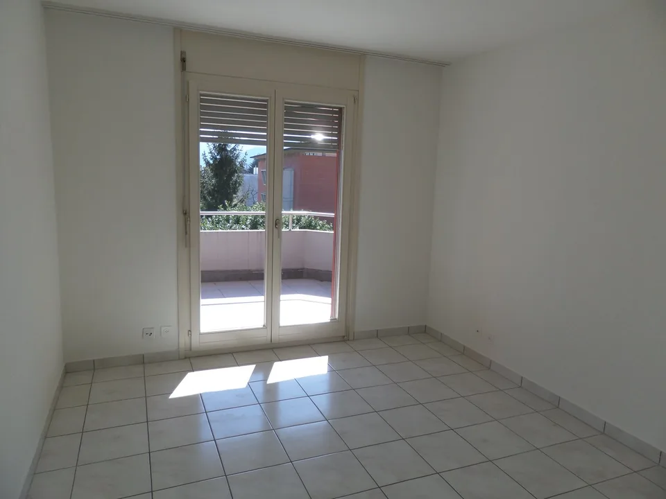 Appartement de 2.5 pièces dans un quartier verdoyant et calme
