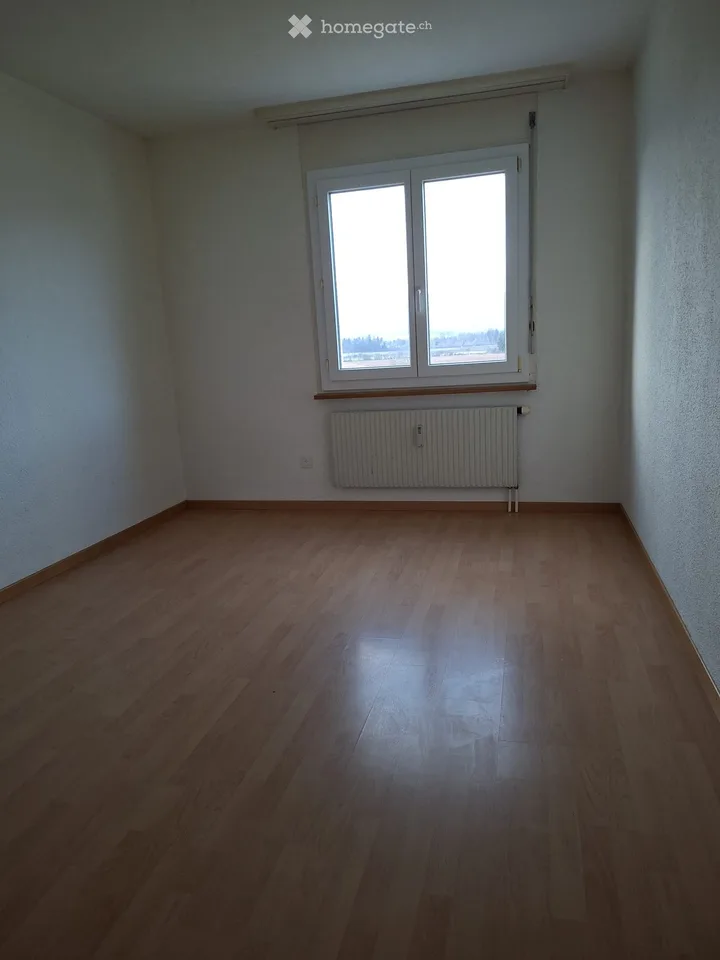 Appartement ensoleillé de 3,5 pièces avec balcon et vue magnifique à Busswil BE