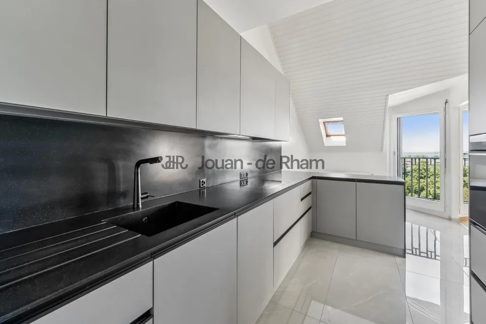 Malagnou | Spacieux appartement rénové au coeur de Genève – photo 2 sur 13