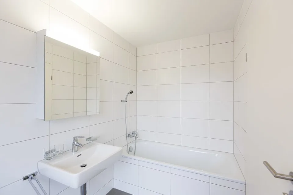 Appartement en attique bien situé avec sa propre tour de lavage – photo 5 sur 8