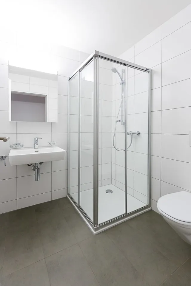 Appartement en attique bien situé avec sa propre tour de lavage – photo 6 sur 8