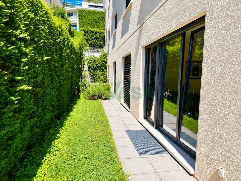 Bel appartamento 6,5 locali con giardino in tranquilla zona collinare – Foto 10 von 13