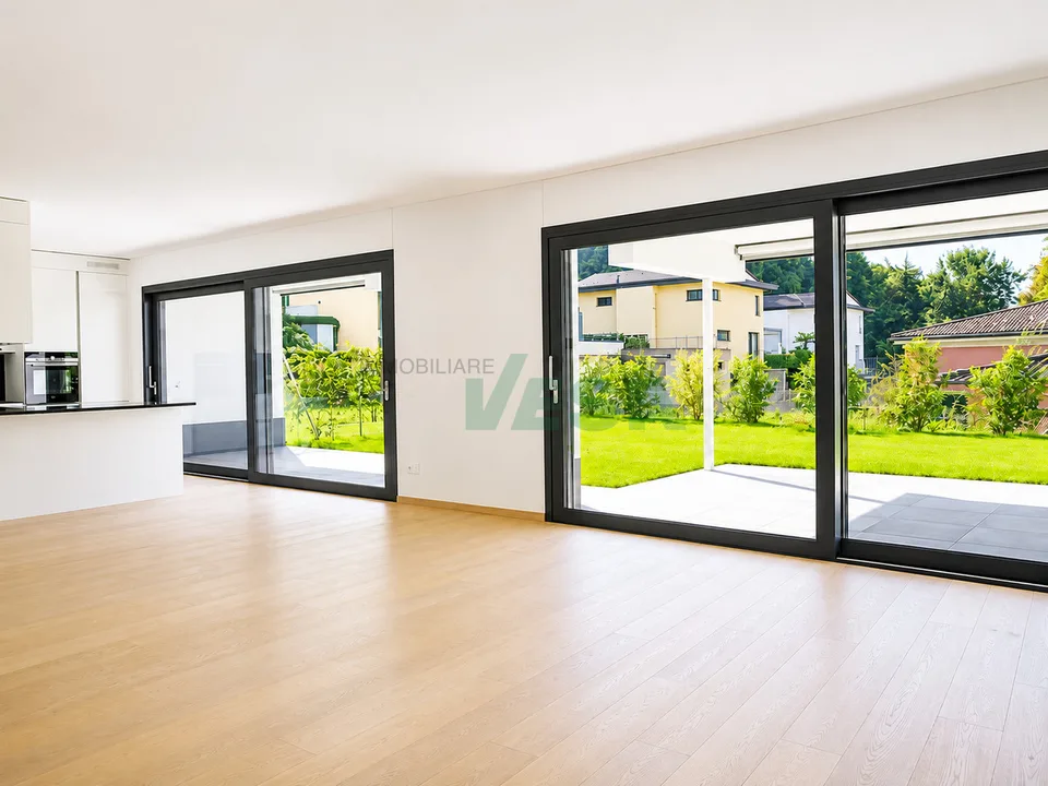 Moderno appartamento 4,5 locali con bella terrazza e giardino privato – Foto 3 von 11