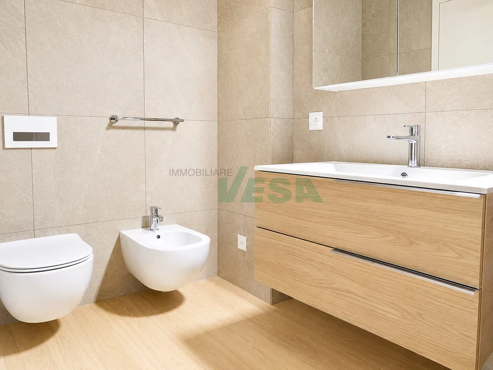 Moderno appartamento 4,5 locali con bella terrazza e giardino privato – Foto 10 von 11