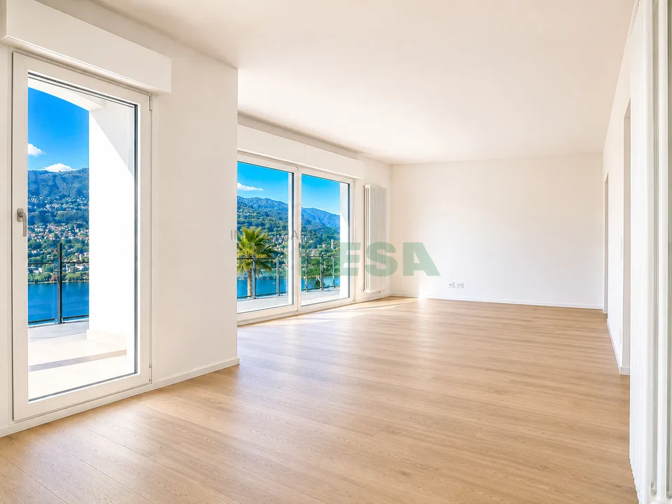 Splendido attico di 4,5 locali con spettacolare vista lago – photo 4 sur 11