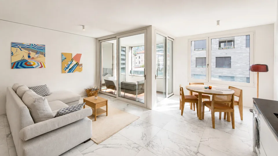 Elegante appartamento di 3.5 locali a pochi passi dal lago – photo 2 sur 8