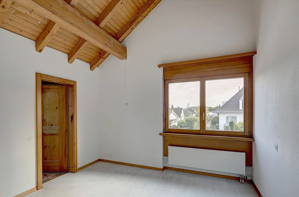 Appartamento mansardato accogliente con caminetto e charme particolare – foto 9 di 11